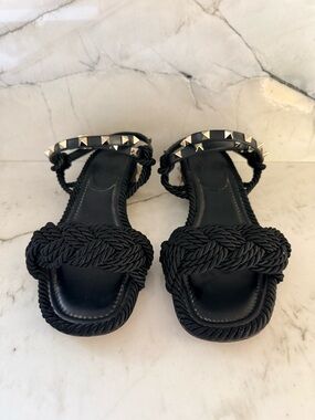 Valentino Garavani Black Braided Rope Flat Sandals with Pyramid Stud Ankle Strap